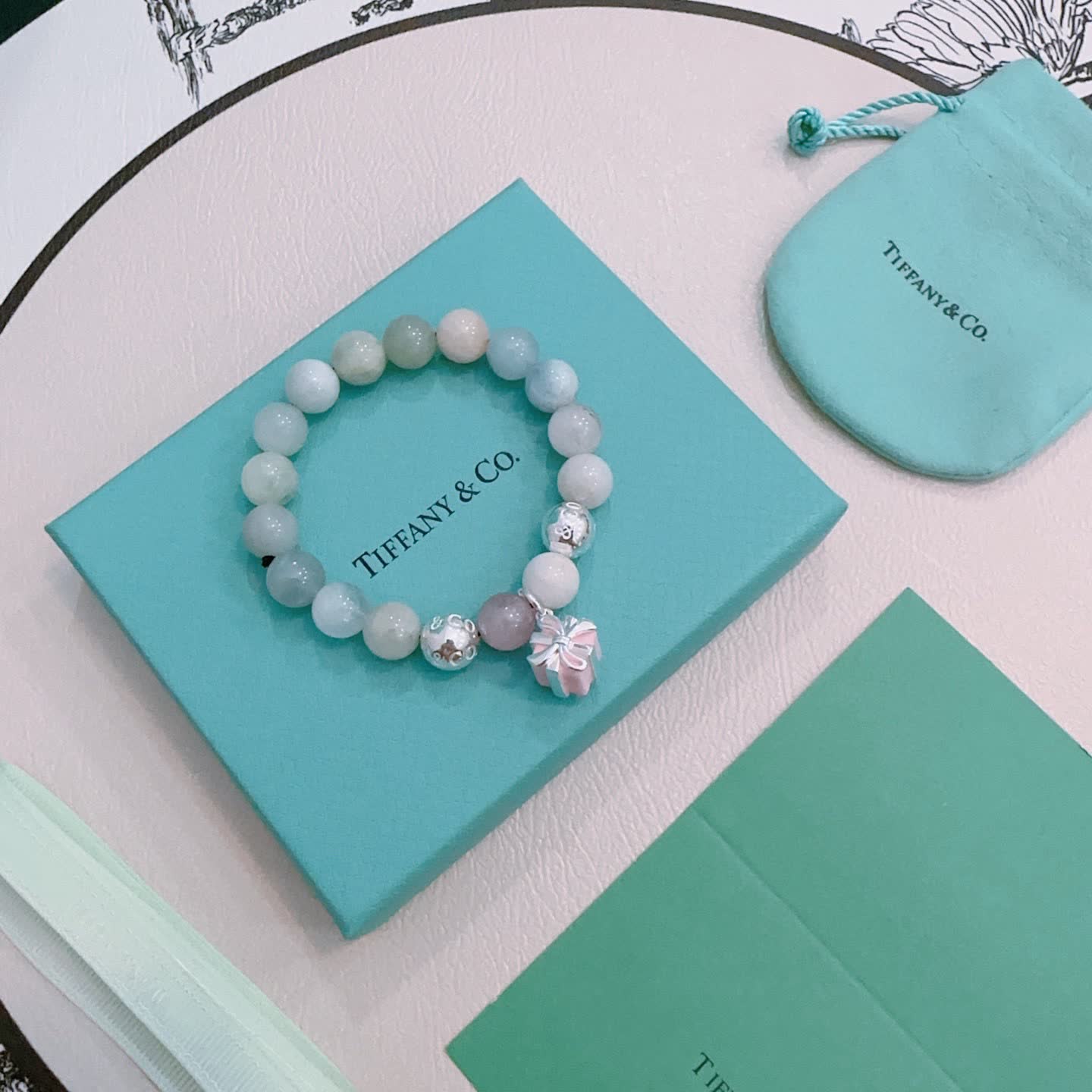 Tiffany & Co. Blue Agate Bead Bracelet with Sterling Silver Charms